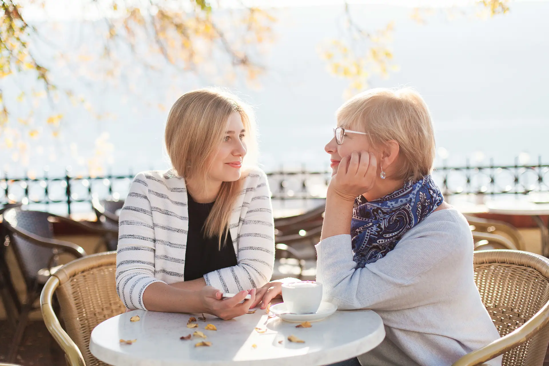 Senior mother and her adult daughter talking
